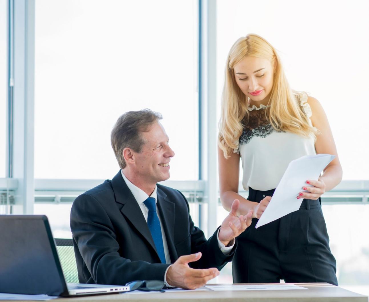 Financial planning education session with participants reviewing investment strategies